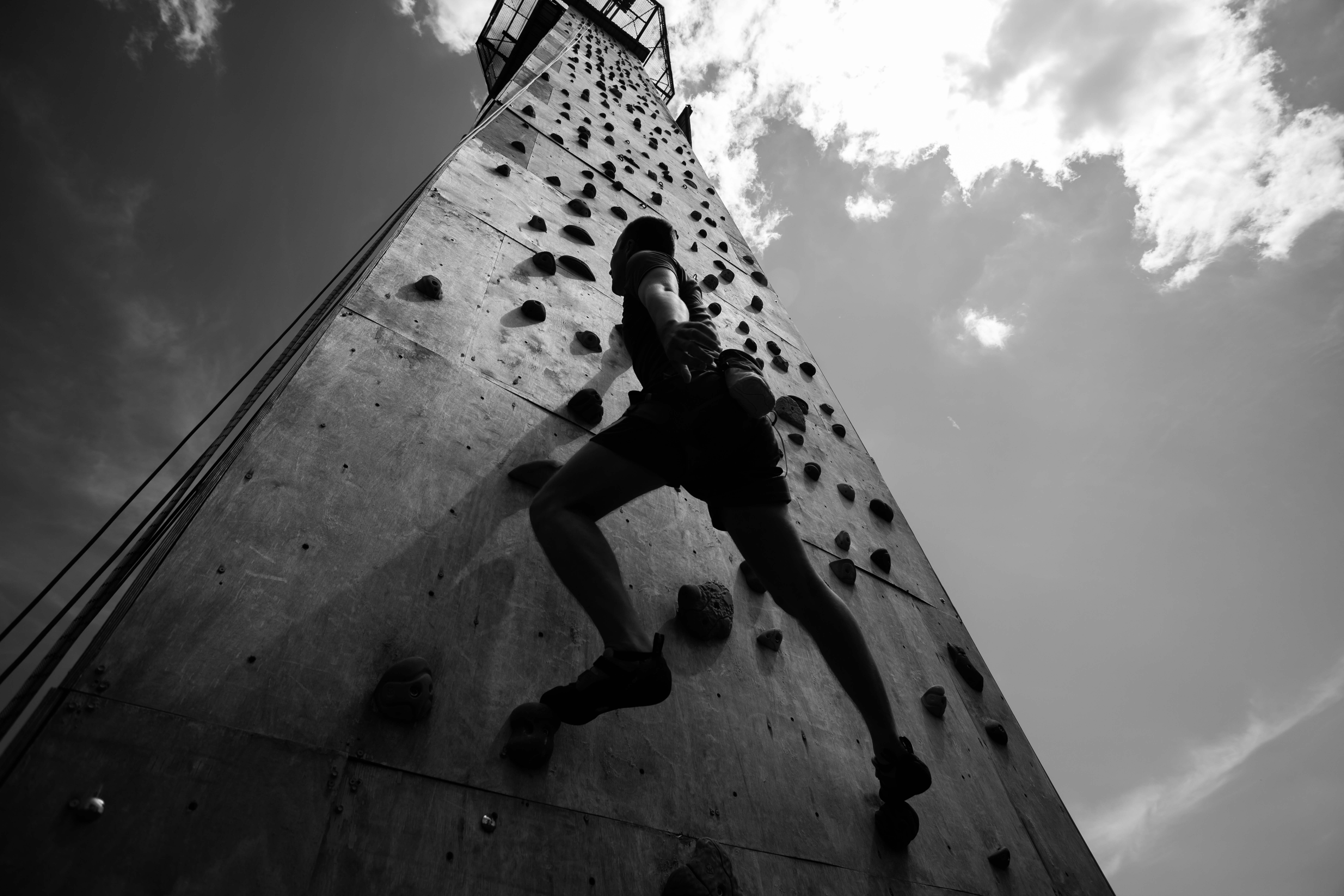 young-man-exercising-indoor-climbing-gym.jpg